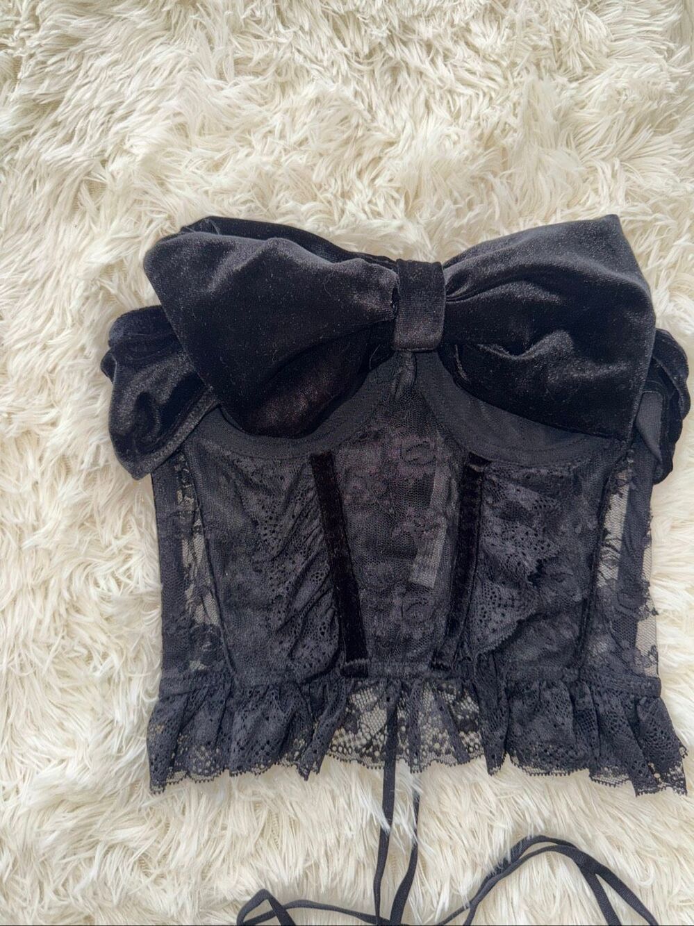 Out from under size small black top with bow 